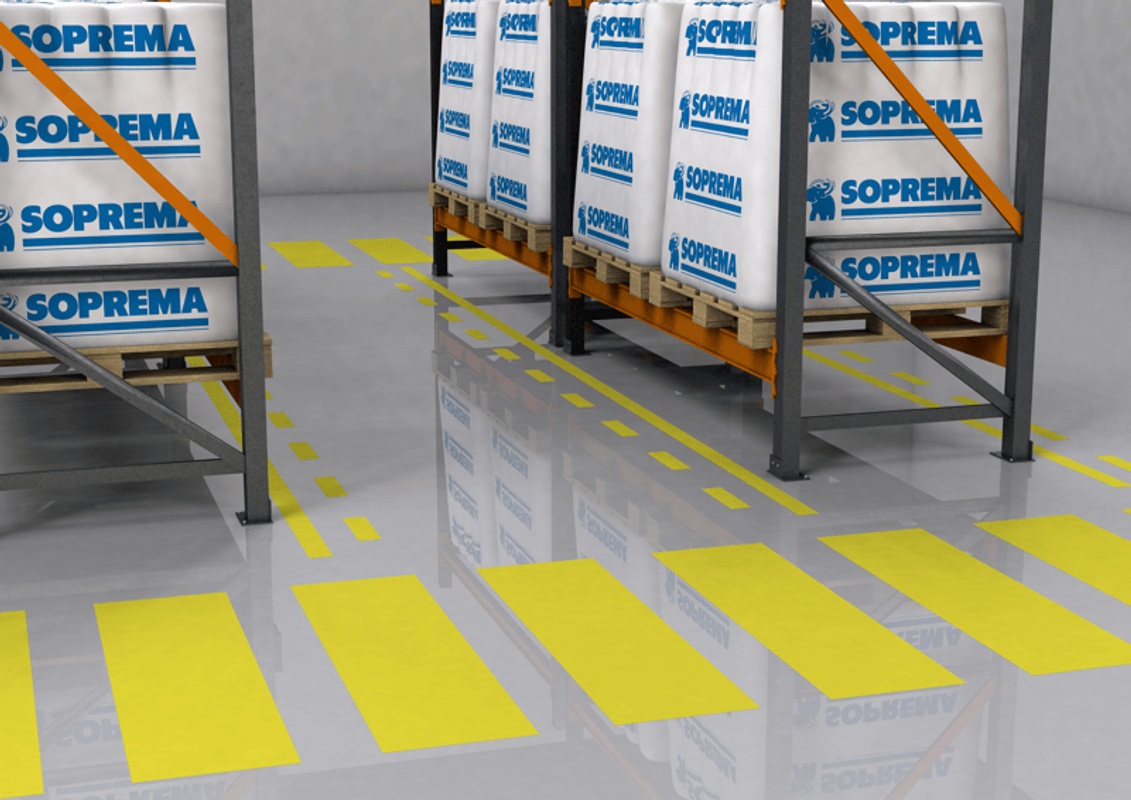 Sistema de pavimento interior industrial con capa de rodadura